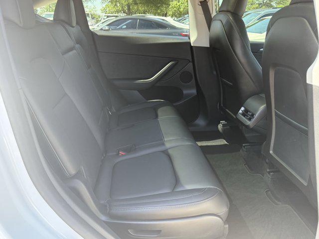 Photo of 2024 Pearl White Multi-Co Tesla Model Y