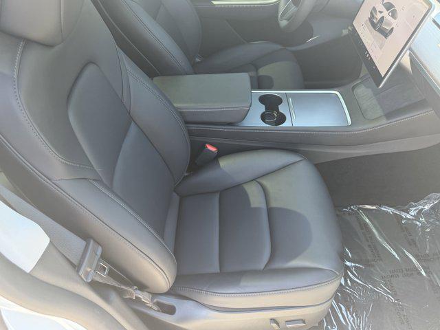Photo of 2024 Pearl White Multi-Co Tesla Model Y