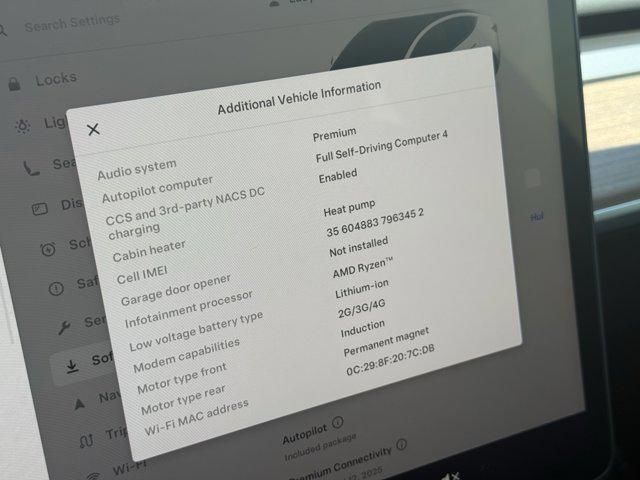 Photo of 2024 Pearl White Multi-Co Tesla Model Y