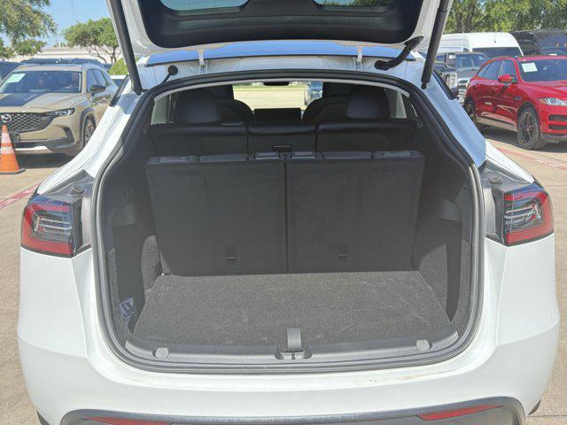 Photo of 2024 Pearl White Multi-Co Tesla Model Y