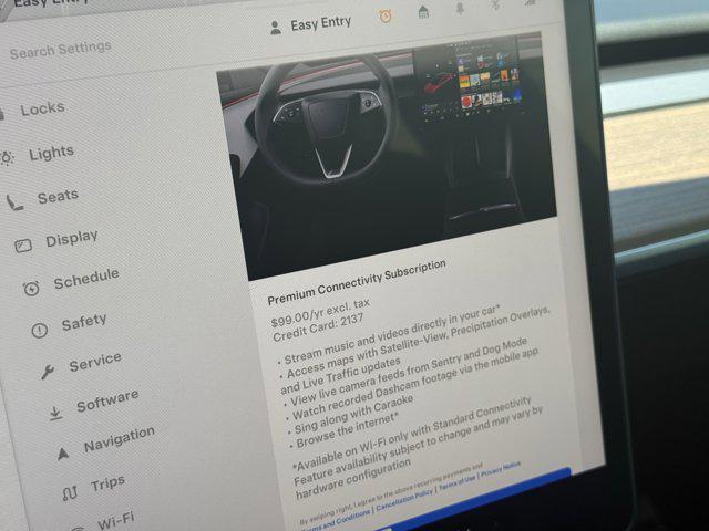 Photo of 2024 Pearl White Multi-Co Tesla Model Y