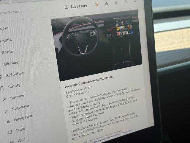 Photo of 2024 Pearl White Multi-Co Tesla Model Y