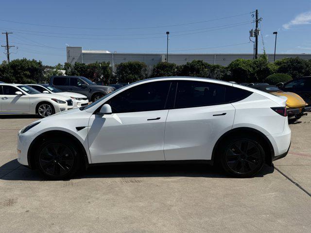 Photo of 2024 Pearl White Multi-Co Tesla Model Y