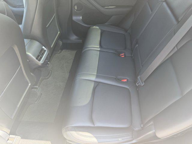 Photo of 2024 Pearl White Multi-Co Tesla Model Y