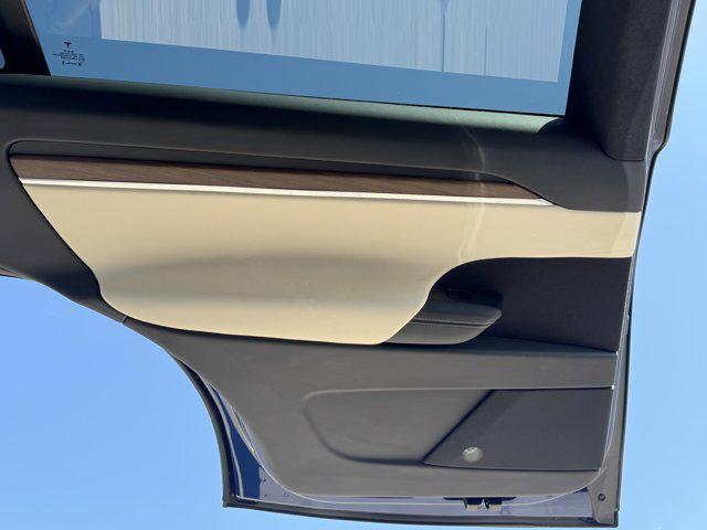 Photo of 2022 Deep Blue Metallic Tesla Model X