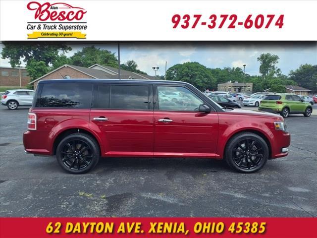 Photo of 2019 Ruby Red Metallic Tinted Clearcoat Ford Flex