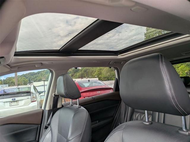 Photo of 2023 Pearl White Tricoat Nissan Rogue