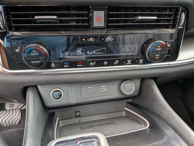 Photo of 2023 Pearl White Tricoat Nissan Rogue
