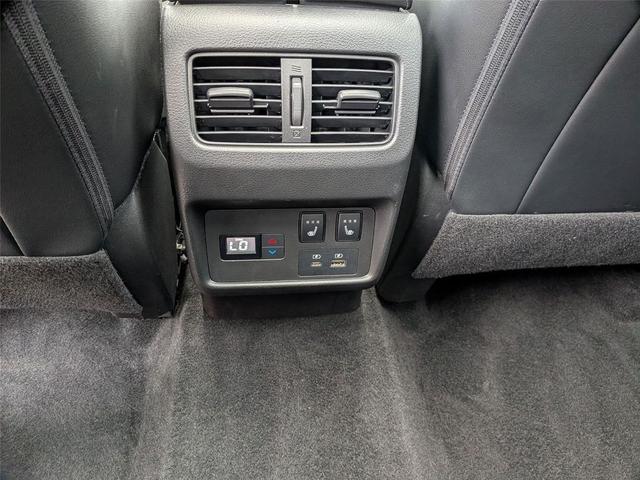 Photo of 2023 Pearl White Tricoat Nissan Rogue