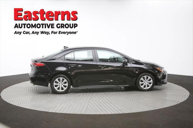 Photo of 2025 Midnight Black Metallic Toyota Corolla