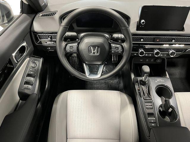 Photo of 2025 Platinum White Pearl Honda Civic Hybrid