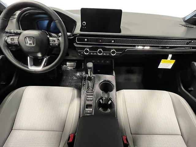 Photo of 2025 Platinum White Pearl Honda Civic Hybrid