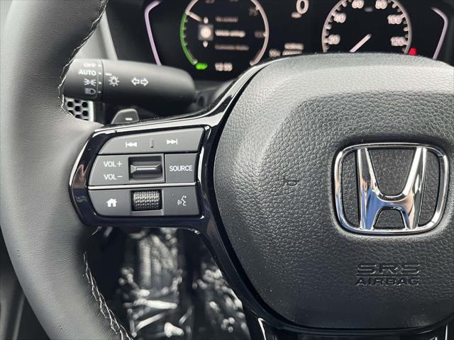 Photo of 2025 Crystal Black Pearl Honda Civic Hybrid