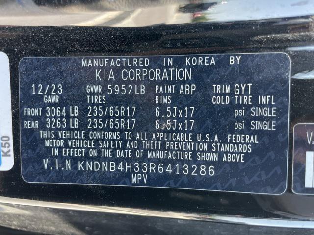 Photo of 2024 Aurora Black Pearl Kia Carnival