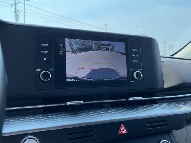Photo of 2024 Aurora Black Pearl Kia Carnival