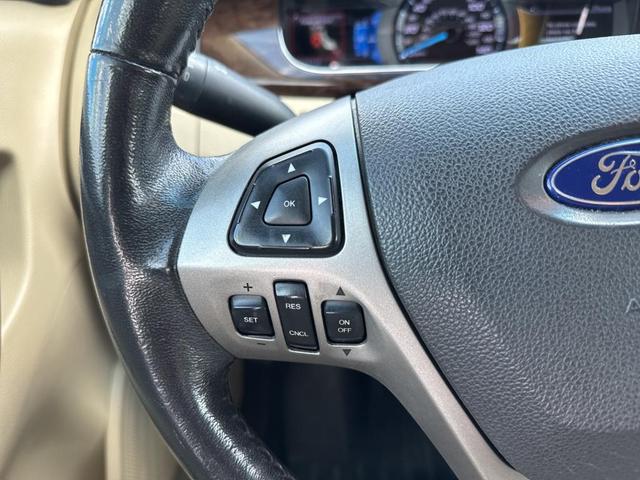 Photo of 2014 White Platinum Tri-Coat Metallic Ford Taurus
