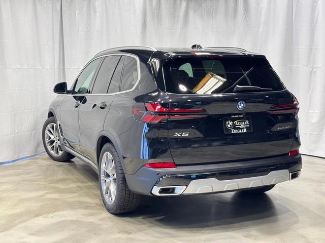 Photo of 2026 Black Sapphire Metallic BMW X5 PHEV