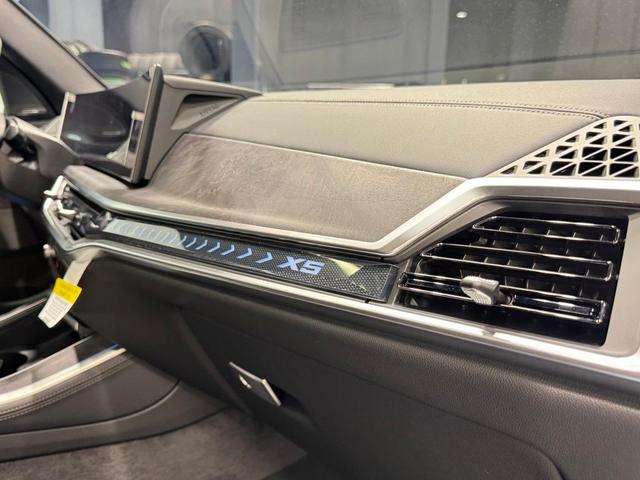 Photo of 2026 Black Sapphire Metallic BMW X5 PHEV