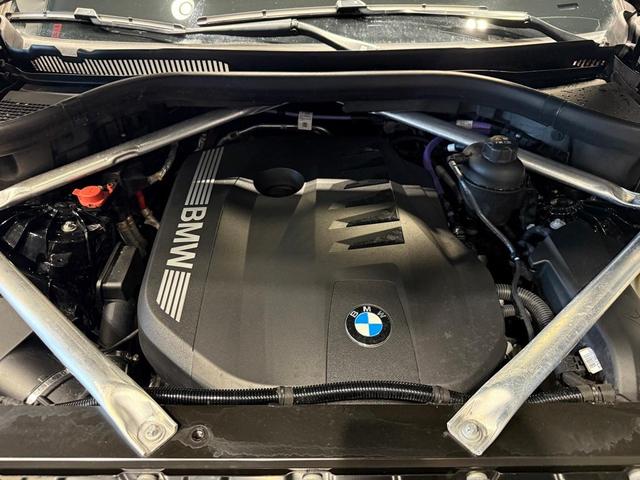 Photo of 2024 Black Sapphire Metallic BMW X6