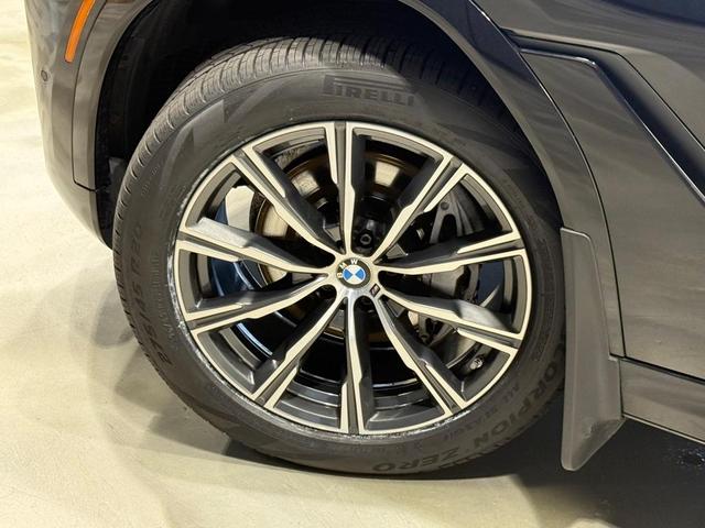 Photo of 2024 Black Sapphire Metallic BMW X6
