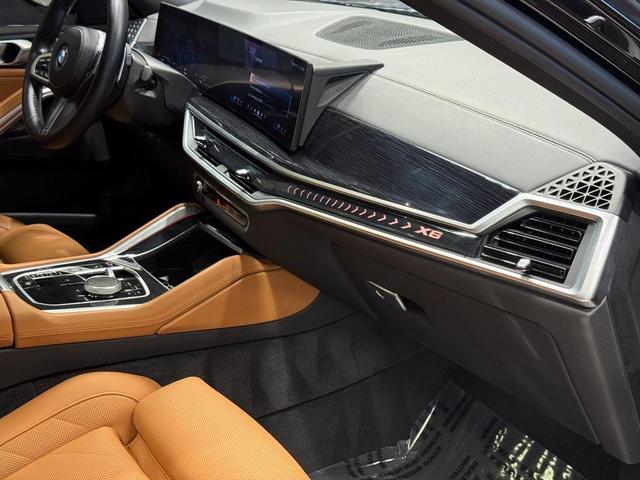 Photo of 2024 Black Sapphire Metallic BMW X6