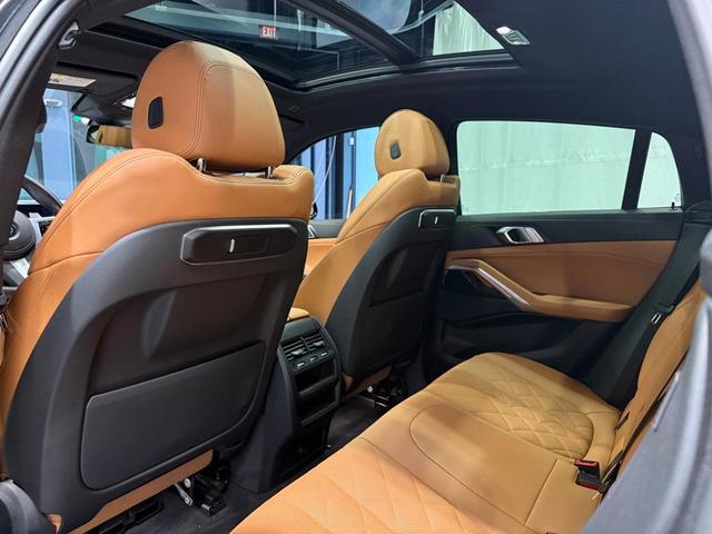 Photo of 2024 Black Sapphire Metallic BMW X6