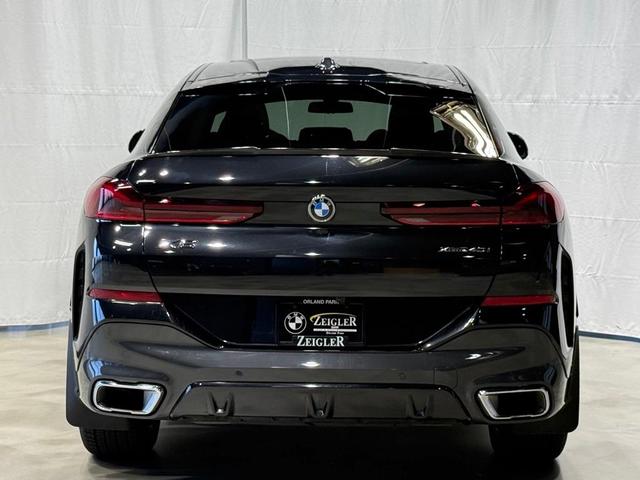 Photo of 2024 Black Sapphire Metallic BMW X6