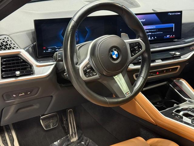 Photo of 2024 Black Sapphire Metallic BMW X6