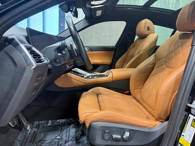 Photo of 2024 Black Sapphire Metallic BMW X6