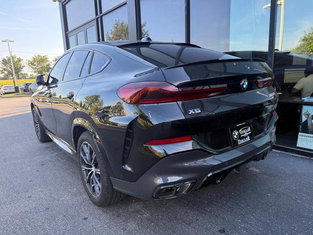 Photo of 2025 Black Sapphire Metallic BMW X6