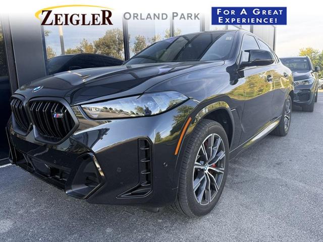Photo of 2025 Black Sapphire Metallic BMW X6