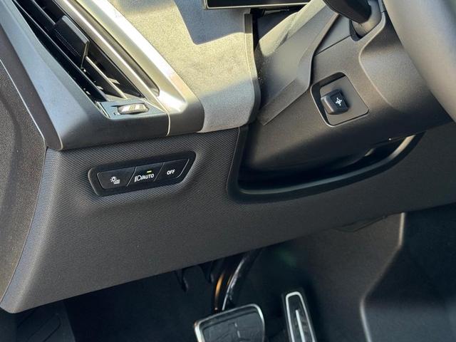 Photo of 2026 Aventurin Red Metallic BMW iX