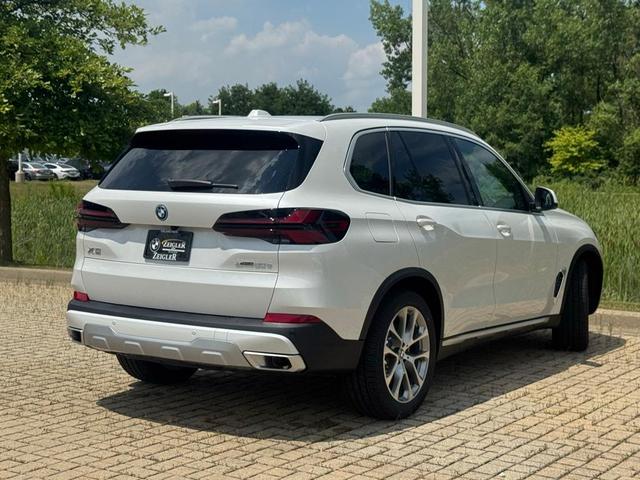 Photo of 2026 Mineral White Metallic BMW X5 PHEV