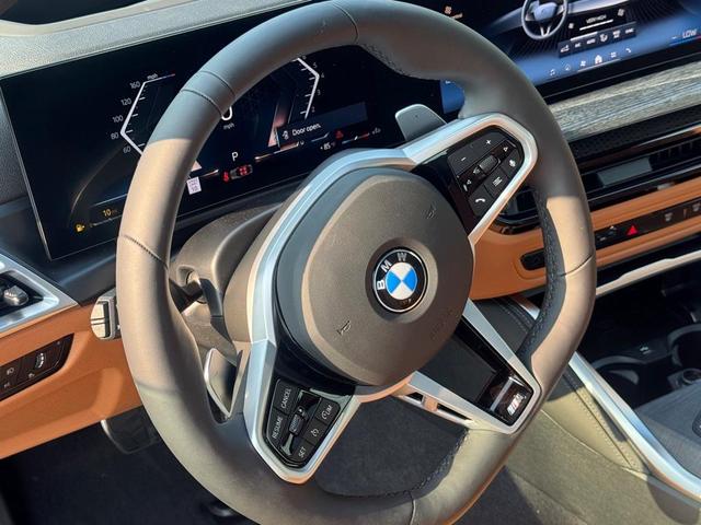 Photo of 2026 Black Sapphire Metallic BMW 430