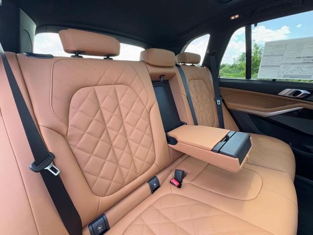 Photo of 2026 Mineral White Metallic BMW X5 PHEV