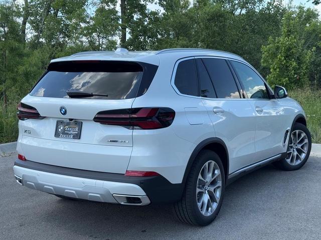 Photo of 2026 Mineral White Metallic BMW X5 PHEV