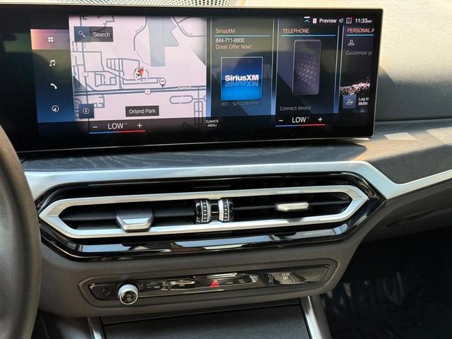 Photo of 2024 Mineral White Metallic BMW 330e