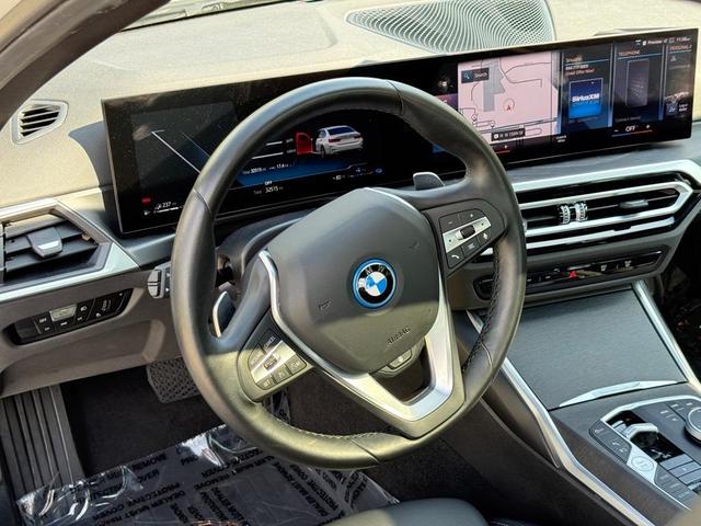 Photo of 2024 Mineral White Metallic BMW 330e