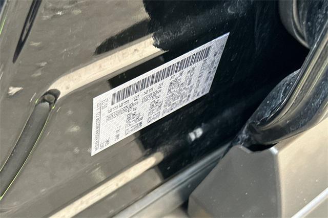 Photo of 2023 Super Black Nissan Rogue