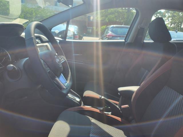 Photo of 2025 Aspen White Nissan Versa