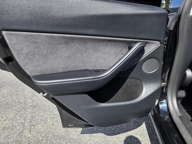 Photo of 2025 Black Tesla Model Y