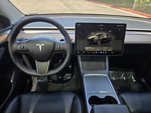 Photo of 2025 Black Tesla Model Y