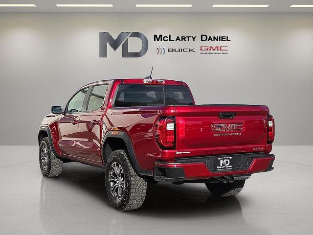Photo of 2024 Volcanic Red Tintcoat GMC Canyon