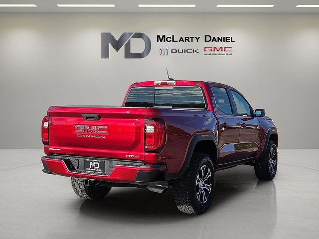 Photo of 2024 Volcanic Red Tintcoat GMC Canyon