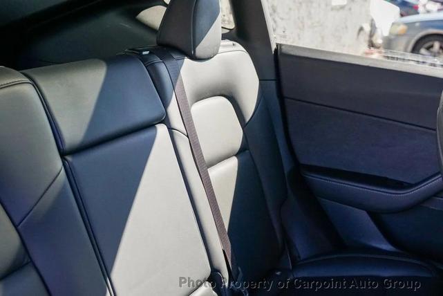 Photo of 2021 Red Multi-Coat Tesla Model Y