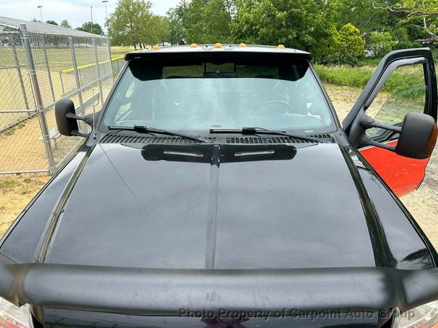 Photo of 2004 Orange Ford F-250