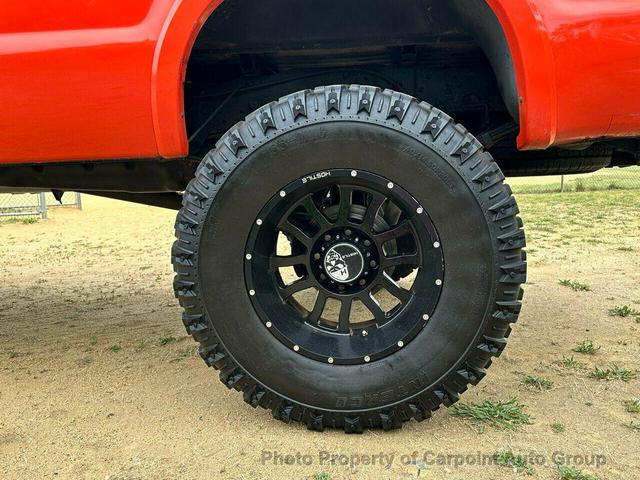 Photo of 2004 Orange Ford F-250