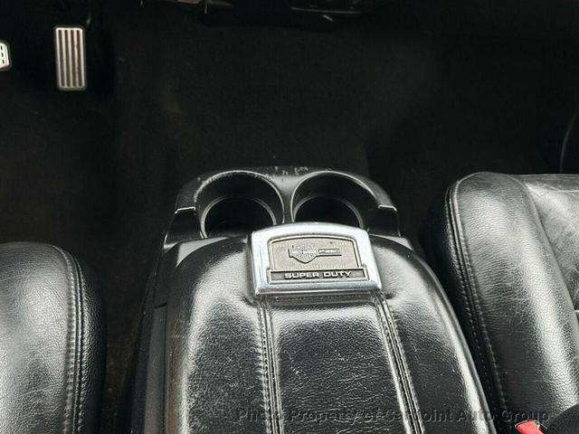 Photo of 2004 Orange Ford F-250