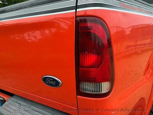 Photo of 2004 Orange Ford F-250