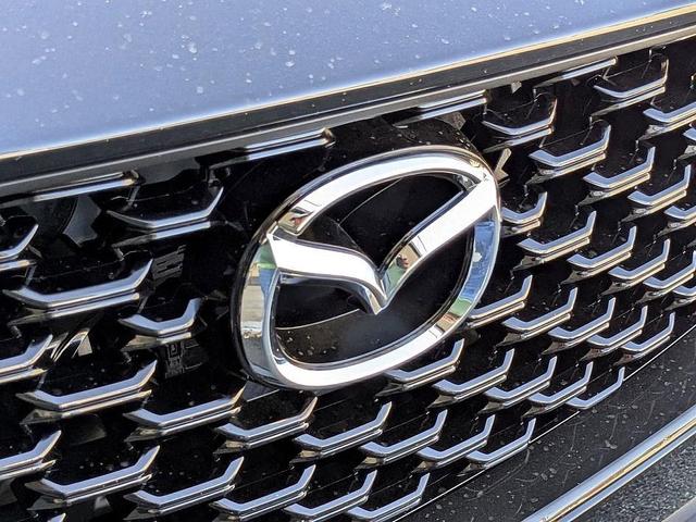 Photo of 2025 Black Mazda CX-50 Hybrid